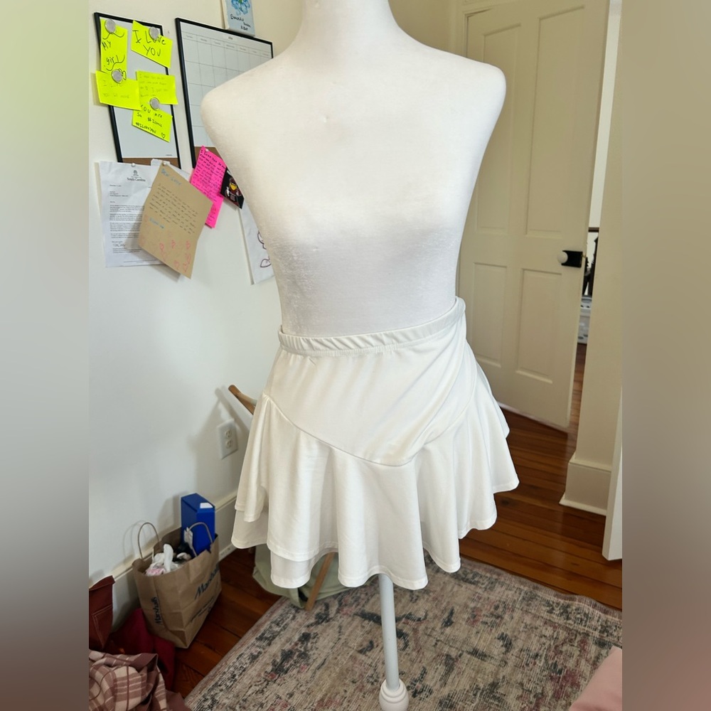 White mini skirt with ruffle detail #miniskirt